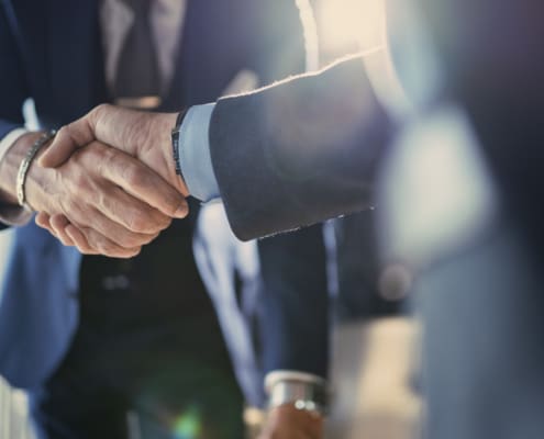 Business partnership meeting in office