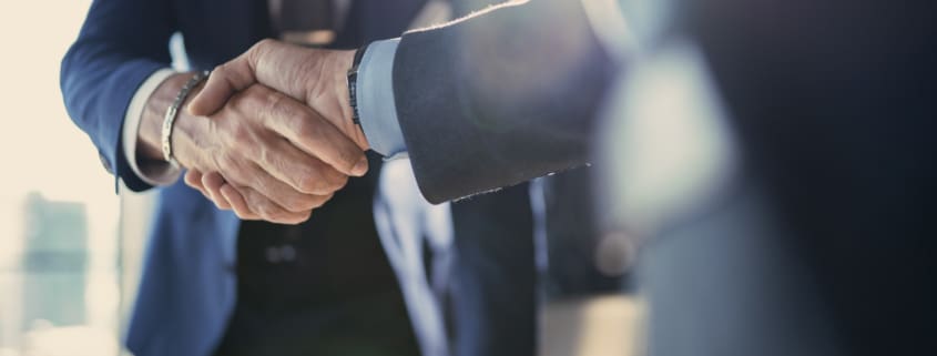 Business partnership meeting in office